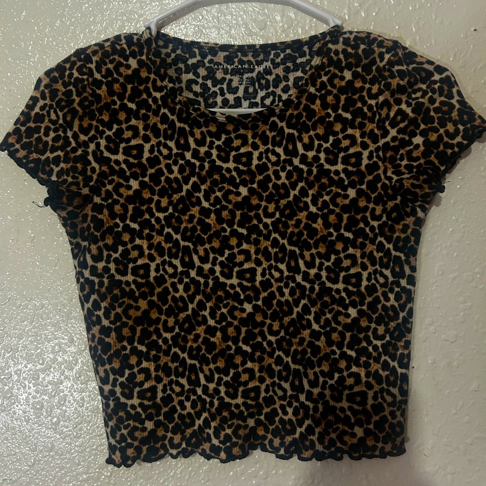 brand new, never worn, slightly cropped